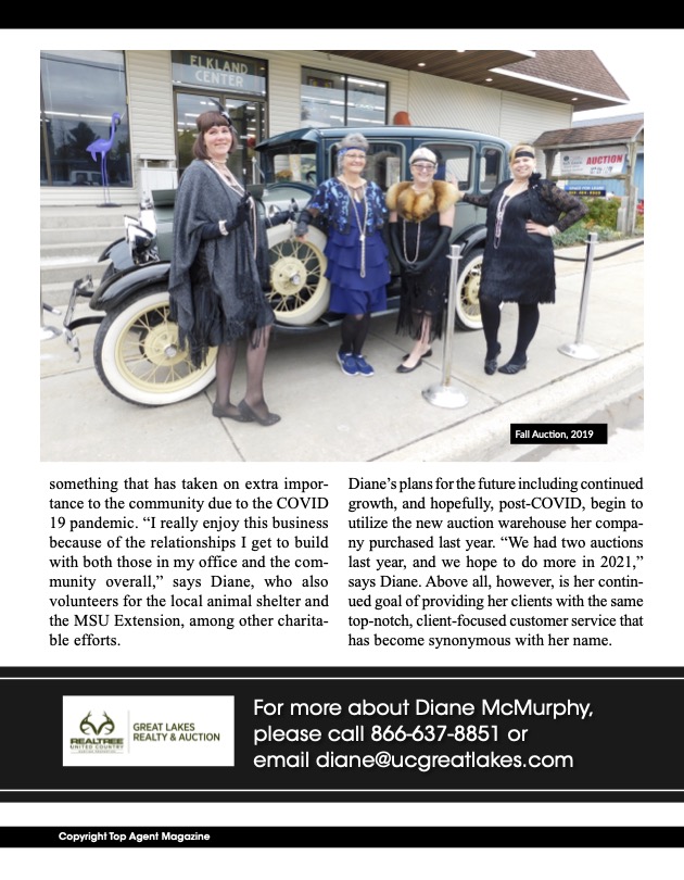 Diane McMurphy Diane McMurphy standing with community members during a United Country auction event in Michigan.