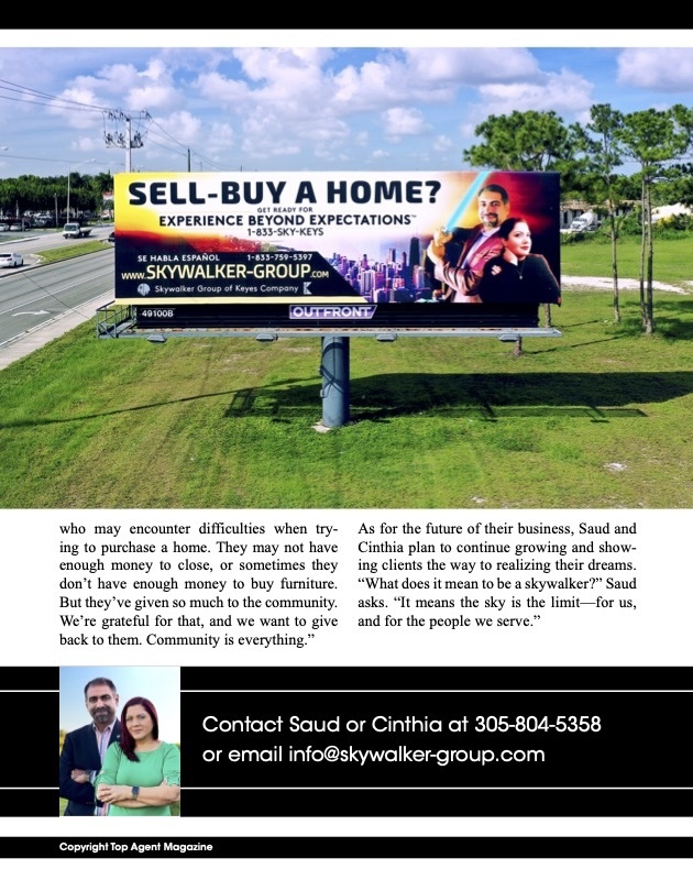 Large highway billboard featuring real estate agents Saud and Cinthia Rai promoting Skywalker Group in Miami
